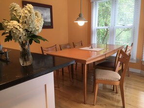 Mid century dining room table seats six comfortably