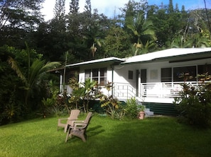 The farmhouse is a classic, redwookd home with oak floors built in 1970