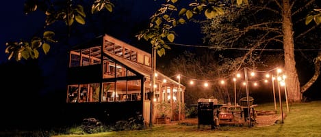 The Bali House is beautiful at night.