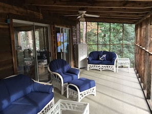 Relaxing screened-in porch.  Overlooks the lake and shoreline.