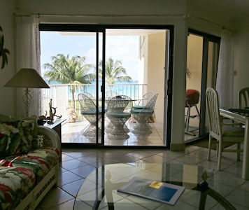 View from the living room with the ocean right there! Balcony seating for 6.