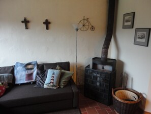 Turf and wood stove in sitting room.