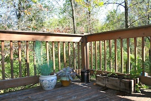An attached deck allows for a beautiful viewing of the nature surrounding you.