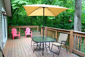 An attached deck allows for a beautiful viewing of the nature surrounding you.