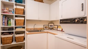  Laundry room with door leading to 1 car garage.