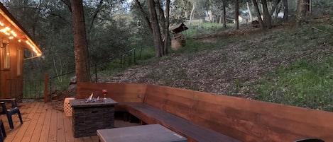 fire pit seating on the back deck off the kitchen