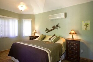 Main bedroom with a vaulted ceiling and ensuite bathroom with 3 person jacuzzi!