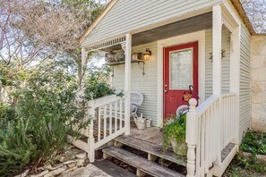 Sip your morning coffee on the intimate and coolly-shaded porch.