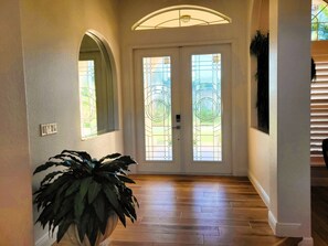 FOYER WITH NEW FRONT DOORS