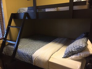 Single over queen bunk bed in second bedroom, with second TV