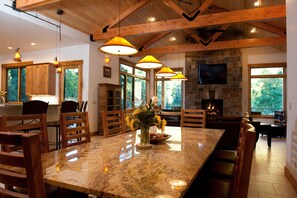 9' granite dining room table (sabrinabrantphotography.com)