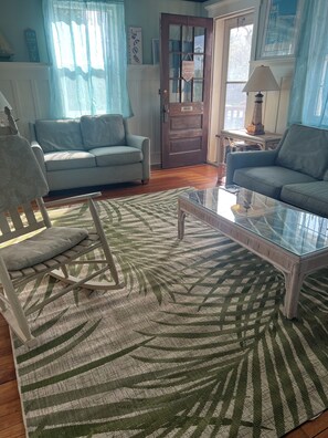 Living room.  Just refinished the floors and painted!