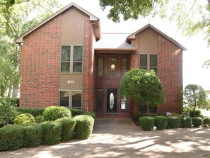 Welcoming front entry and circular drive with room for 3-4 cars 