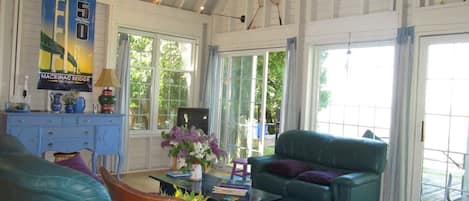 Cozy living room opens to the deck overlooking Lake Michigan