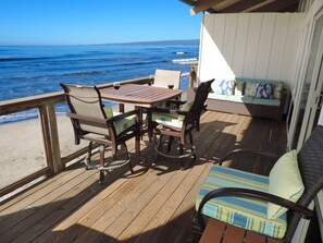 Outside eating and relaxing with ocean/beach views 111564