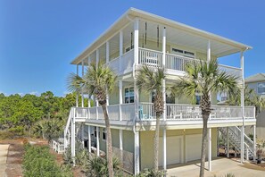 House exterior from street; plenty of parking on driveway(4-5 cars) & private street(2-3)