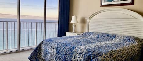 Master Bedroom with a view of the beautiful beach and blue ocean