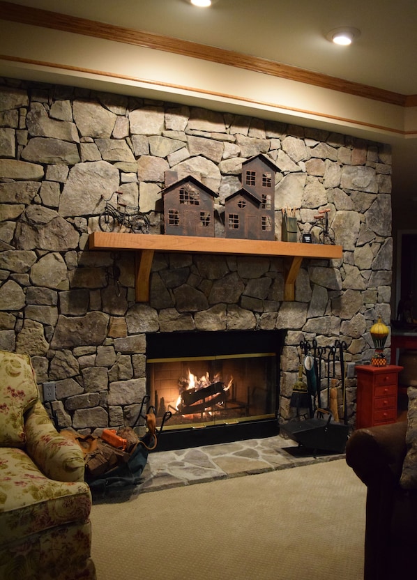 Free firewood and the stone fireplace are just two amenities at this condo.