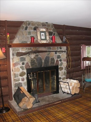 River rock fireplace in living room
