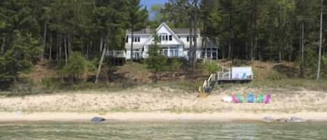 view of cottage from kayak