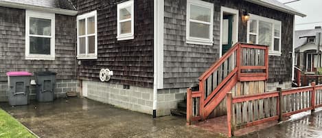 Parking space and house entrance 