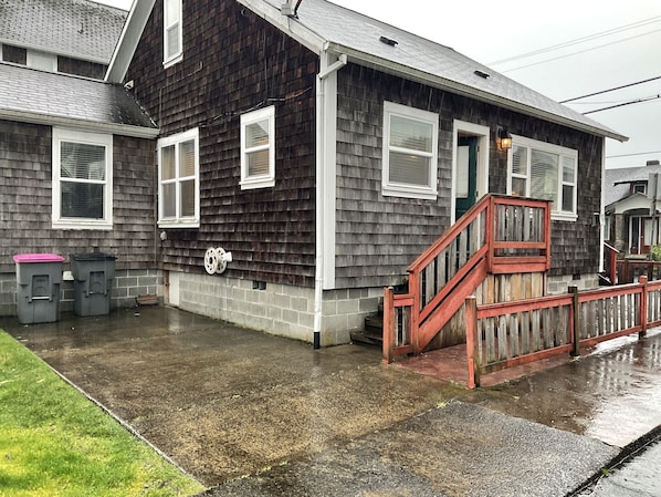 Parking space and house entrance 