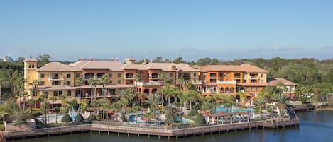 Check in building with lazy river, hot tub, spray area and activity  center.