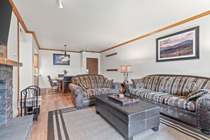 Living room with dining area in the background