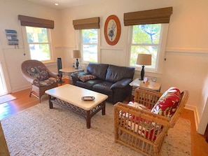The living Room has elegant tropical casual furnishings