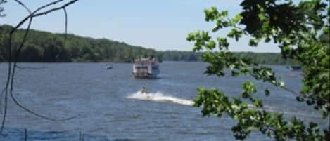 river view from the 1st floor showing a water skier and the River paddle boat