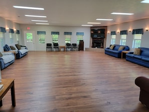 Spacious Fellowship Hall 2. Tables and Chairs for 80. Fireplace. 70 in Smart TV.