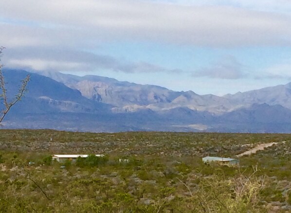 Our ranch home on left and guest house on right; view from the Hot Springs Rd.