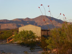 Side view of the Guest House. We are surrounded by mountains.