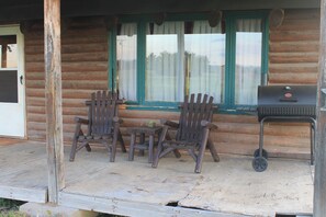 Front porch chairs and charcoal grill