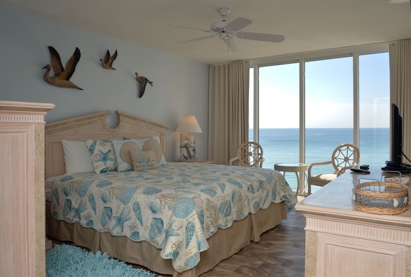 Oh, so elegant master suite!  Floor to ceiling windows capture the Gulf view!!!