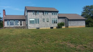 Front of House with patio.  All rooms face the ocean.