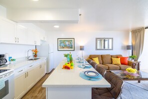 Cook your favorite meals in your fully equipped kitchen with a dining area for up to four guests.