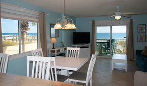 Dining area with large window and plenty of natural light.