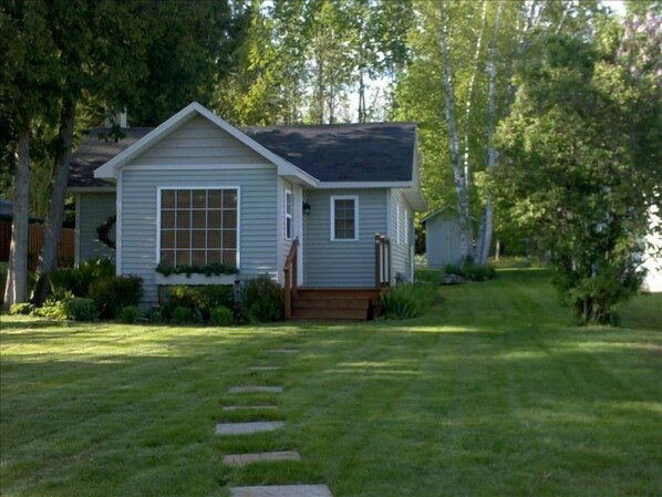 View from Parking Area Near Cincinnati St of the Front Lawn & Cottage.