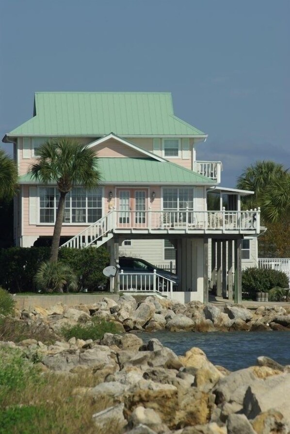 Exterior, there is a shallow, sandy beach at low tide to find shells