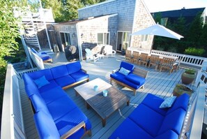 2nd Fl deck also includes dining table, sectional lounge area, & BBQ