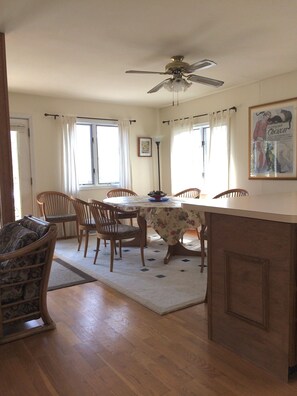 Dining area, opens onto deck; table expands for seating for 10!