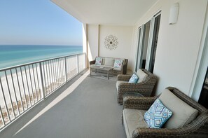 Outfitted with a table, 4 high top chairs, 2 sitting chairs, & 1 full size couch