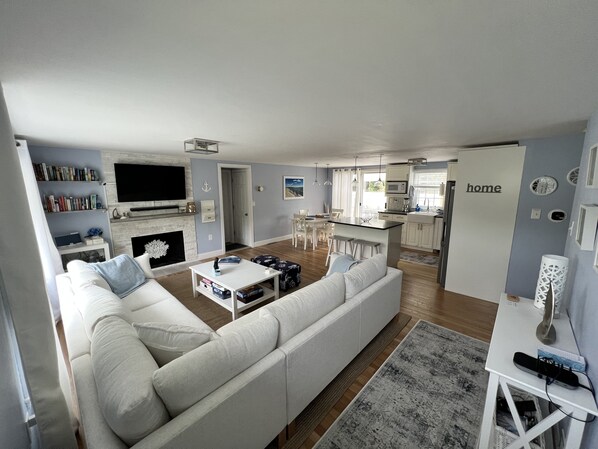 Entrance/Open concept Living - new living room furniture, rugs.  