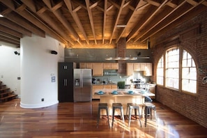 Kitchen equipped with utensils to whip up a gourmel meal.