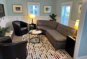 John Widdicomb sofa living area with TV