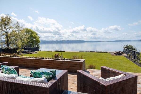 Deck overlooking the land, beach and lake