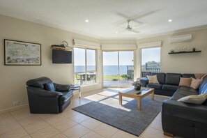 Modern decor, panoramic sea views from the living area and deck.