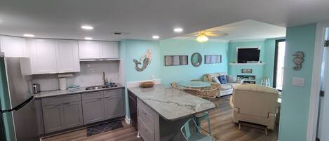 Open concept Kitchen / dining / living room makes more memories