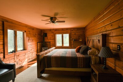 Stunning Log Retreat Nestled in Native Prairie/Woodland Setting